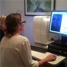 Dr Christine Gould Skin Analysis with patient